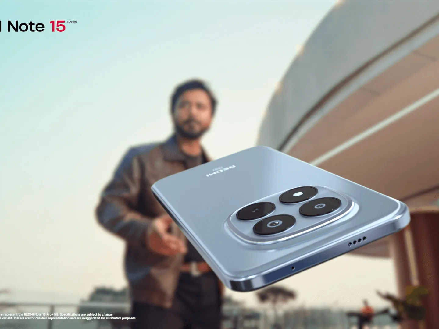 Redmi Note 15 phone floating beside a man in a city street